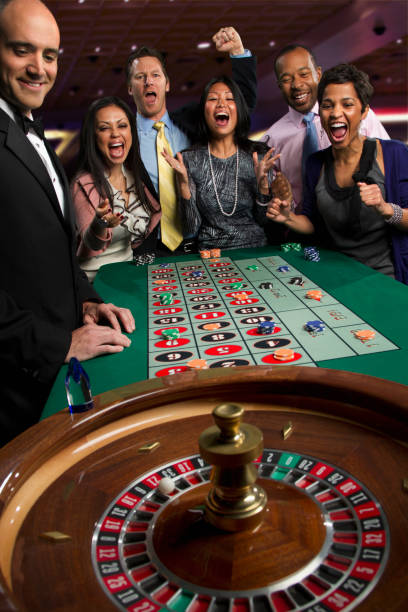 kaptenmpo multilingual dealer in Jakarta studio conducting BandarQ game for online players